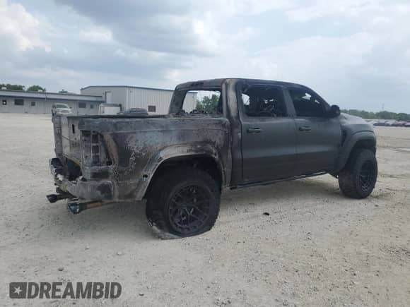 2024 Ram 1500 TRX with VIN 1C6SRFU9XRN135374, listed as a Copart auction lot 54679005 with Not provided miles and Non repairable. Bid and sale history available at DreamBid. Image 3.
