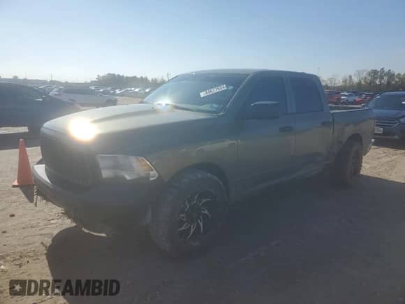 2013 Ram 1500 Tradesman with VIN 1C6RR6KG7DS566166, listed as a Copart auction lot 84677624 with 124,784 mi miles and Salvage title. Bid and sale history available at DreamBid. Image 1.