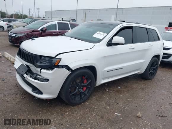 2016 Jeep Grand Cherokee SRT with VIN 1C4RJFDJ0GC456325, listed as a IAAI auction lot 41425211 with 159,746 mi miles and . Bid and sale history available at DreamBid. Image 2.
