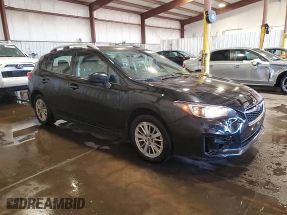 2017 Subaru Impreza Premium with VIN 4S3GTAB69H3727614, listed as a Copart auction lot 87101255 with 148,939 mi miles and Salvage title. Bid and sale history available at DreamBid. Image 4.