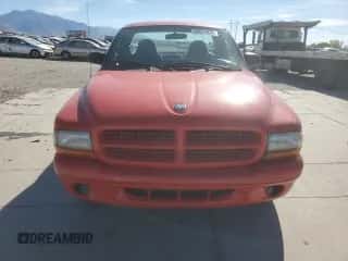 2000 Dodge Dakota Sport z VIN 1B7GL26N4YS797289, wystawiony jako Copart lot #90517435 z przebiegiem 161 517 mil mil oraz Szkoda całkowita • Salvage title. Historia ofert i sprzedaży dostępna na DreamBid. Obrazek 5.