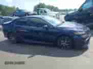 2021 Toyota Camry SE Nightshade z VIN 4T1G11AKXMU519763, wystawiony jako IAAI lot #43319480 z przebiegiem 97 862 mil mil oraz . Historia ofert i sprzedaży dostępna na DreamBid. Obrazek 14.