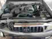 2001 Toyota Tacoma PreRunner с VIN 5TEGN92N51Z853167, выставлен на аукционе Copart как лот 69870655 с пробегом 228 921 миль миль и Списание • Salvage title. История ставок и продаж доступна на DreamBid. Изображение 11.