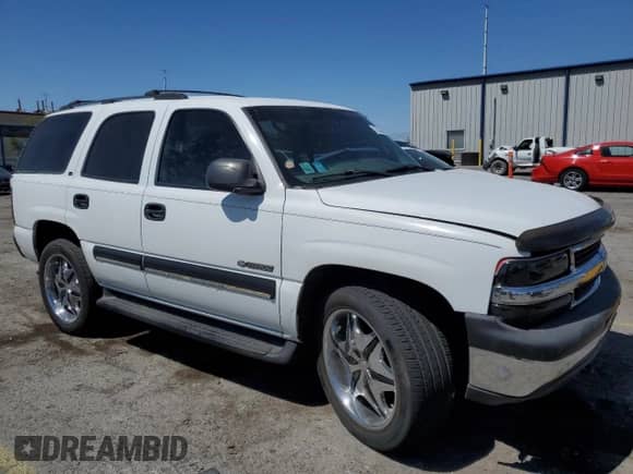 2000 Chevrolet Tahoe LS with VIN 1GNEK13T7YJ146064, listed as a Copart auction lot 57533065 with 261,388 mi miles and Salvage title. Bid and sale history available at DreamBid. Image 4.