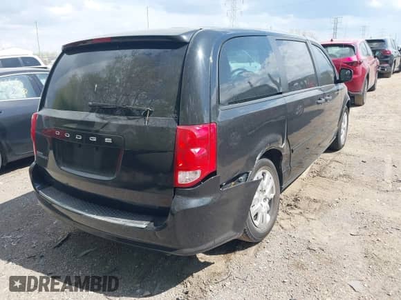 2016 Dodge Grand Caravan SE with VIN 2C4RDGBG4GR317018, listed as a IAAI auction lot 42102559 with 192,788 mi miles and . Bid and sale history available at DreamBid. Image 4.