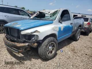 2003 Dodge 1500 ST with VIN 1D7HA16K63J620869, listed as a Copart auction lot 60936475 with 100,599 mi miles and Salvage title. Bid and sale history available at DreamBid. Image 1.