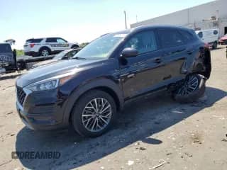 2019 Hyundai Tucson Night Edition с VIN KM8J33AL9KU056645, выставлен на аукционе Copart как лот 55635275 с пробегом 64 552 миль миль и Списание • Salvage title. История ставок и продаж доступна на DreamBid. Изображение 1.
