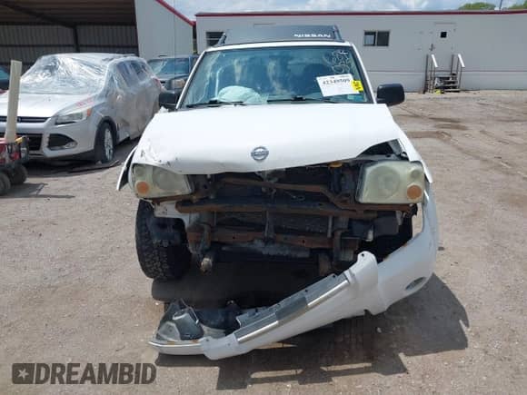 2003 Nissan Frontier XE z VIN 1N6ED29Y83C451126, wystawiony jako IAAI lot #42349509 z przebiegiem 182 193 mil mil oraz . Historia ofert i sprzedaży dostępna na DreamBid. Obrazek 12.