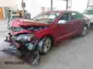 2014 Chevrolet Impala LTZ with VIN 1G1145SL1EU115373, listed as a IAAI auction lot 42570890 with 103,225 mi miles and . Bid and sale history available at DreamBid. Image 2.