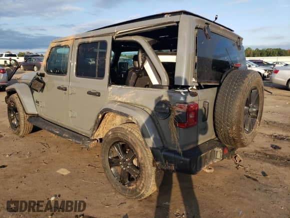 2021 Jeep Wrangler Unlimited Sahara High Altitude with VIN 1C4HJXEG0MW671105, listed as a Copart auction lot 74175244 with 51,610 mi miles and Salvage title. Bid and sale history available at DreamBid. Image 2.