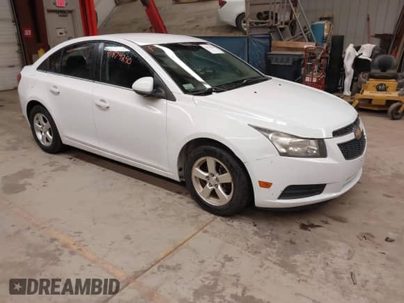2013 Chevrolet Cruze 1LT with VIN 1G1PD5SBXD7253086, listed as a IAAI auction lot 41874290 with 121,233 mi miles and . Bid and sale history available at DreamBid. Image 1.