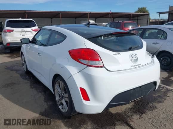 2017 Hyundai Veloster with VIN KMHTC6ADXHU318331, listed as a IAAI auction lot 41588356 with 48,282 mi miles and . Bid and sale history available at DreamBid. Image 3.