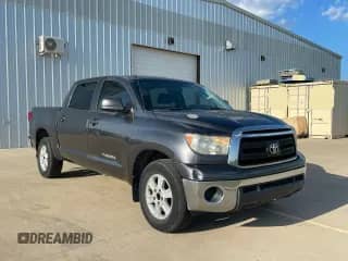 2012 Toyota Tundra with VIN 5TFEM5F12CX043550, listed as a Copart auction lot 83765415 with 242,142 mi miles and Clean title. Bid and sale history available at DreamBid. Image 1.