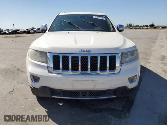 2012 Jeep Grand Cherokee Overland с VIN 1C4RJECT5CC193062, выставлен на аукционе Copart как лот 59890265 с пробегом 170 537 миль миль и Списание • Salvage title. История ставок и продаж доступна на DreamBid. Изображение 5.
