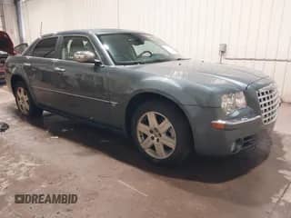 2005 Chrysler 300 300C AWD with VIN 2C3AK63H05H662168, listed as a IAAI auction lot 42574275 with 144,501 mi miles and . Bid and sale history available at DreamBid. Image 1.