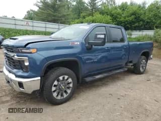 2024 Chevrolet Silverado 2500HD LT z VIN 1GC4YNEY7RF463821, wystawiony jako Copart lot #61624715 z przebiegiem 4 579 mil mil oraz Szkoda całkowita • Salvage title. Historia ofert i sprzedaży dostępna na DreamBid. Obrazek 1.