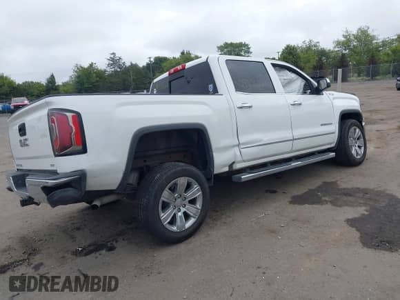 2017 GMC Sierra 1500 SLT with VIN 3GTU2NEC6HG345813, listed as a IAAI auction lot 42940622 with 174,127 mi miles and . Bid and sale history available at DreamBid. Image 4.