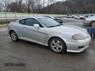 2006 Hyundai Tiburon GS с VIN KMHHM65D96U222152, выставлен на аукционе Copart как лот 85370164 с пробегом 58 892 миль миль и Чистый • Clean title. История ставок и продаж доступна на DreamBid. Изображение 4.