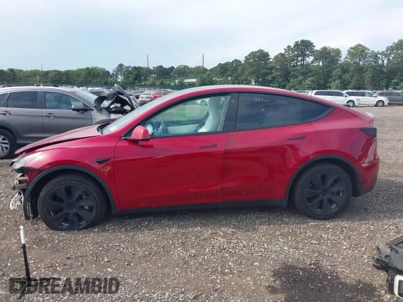 2022 Tesla Model Y Long Range z VIN 7SAYGAEE3NF484623, wystawiony jako IAAI lot #42982060 z przebiegiem 29 313 mil mil oraz . Historia ofert i sprzedaży dostępna na DreamBid. Obrazek 13.