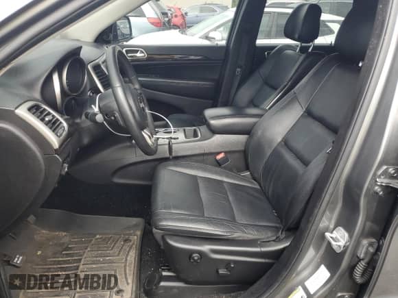 2012 Jeep Grand Cherokee Laredo with VIN 1C4RJFAG1CC293722, listed as a Copart auction lot 68848665 with 114,707 mi miles and Salvage title. Bid and sale history available at DreamBid. Image 7.
