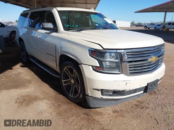 2015 Chevrolet Suburban LTZ z VIN 1GNSKKKCXFR729558, wystawiony jako IAAI lot #43487566 z przebiegiem 109 722 mil mil oraz . Historia ofert i sprzedaży dostępna na DreamBid. Obrazek 1.