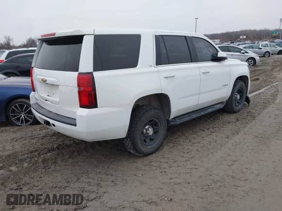 2015 Chevrolet Tahoe with VIN 1GNSK4EC5FR622943, listed as a IAAI auction lot 41321324 with 129,411 mi miles and . Bid and sale history available at DreamBid. Image 4.