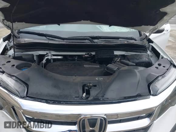 2020 Honda Pilot EX z VIN 5FNYF5H34LB019069, wystawiony jako IAAI lot #41538583 z przebiegiem 55 424 mil mil oraz . Historia ofert i sprzedaży dostępna na DreamBid. Obrazek 10.