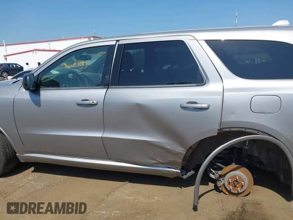 2019 Dodge Durango GT with VIN 1C4RDJDG5KC701353, listed as a IAAI auction lot 42569385 with 112,616 mi miles and . Bid and sale history available at DreamBid. Image 14.