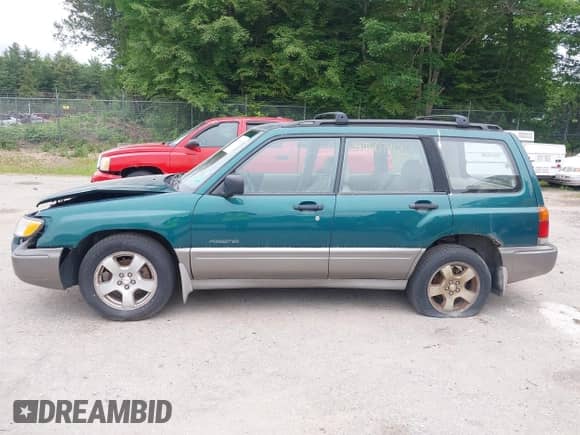 1998 Subaru Forester S with VIN JF1SF6558WH700928, listed as a IAAI auction lot 42507465 with 158,956 mi miles and . Bid and sale history available at DreamBid. Image 12.