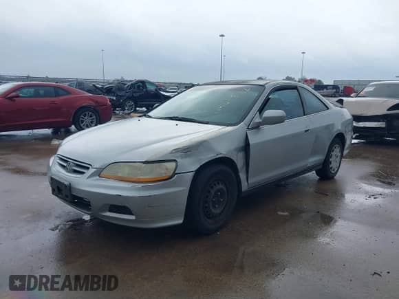 2001 Honda Accord LX z VIN 1HGCG32401A024967, wystawiony jako IAAI lot #41467592 z przebiegiem 234 769 mil mil oraz . Historia ofert i sprzedaży dostępna na DreamBid. Obrazek 18.