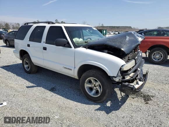 2003 Chevrolet Blazer LS с VIN 1GNCS13X43K162199, выставлен на аукционе Copart как лот 49215295 с пробегом Не указан миль и Списание • Salvage title. История ставок и продаж доступна на DreamBid. Изображение 4.