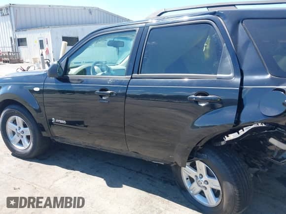 2009 Mercury Mariner Hybrid with VIN 4M2CU29359KJ17577, listed as a IAAI auction lot 43091811 with 247,830 mi miles and . Bid and sale history available at DreamBid. Image 15.