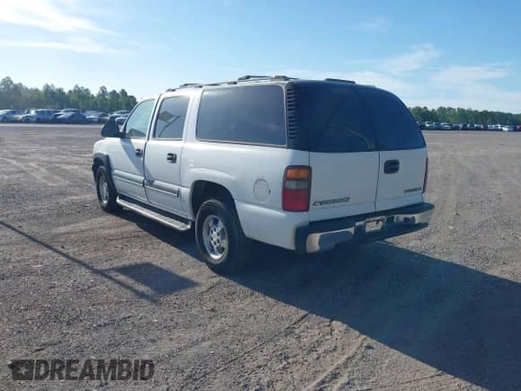 2003 Chevrolet Suburban LT z VIN 1GNEC16ZX3J197984, wystawiony jako IAAI lot #42606954 z przebiegiem 182 435 mil mil oraz . Historia ofert i sprzedaży dostępna na DreamBid. Obrazek 3.