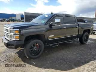 2015 Chevrolet Silverado 1500 High Country z VIN 3GCUKTEC4FG381842, wystawiony jako Copart lot #84038655 z przebiegiem 149 268 mil mil oraz Czysty tytuł • Clean title. Historia ofert i sprzedaży dostępna na DreamBid. Obrazek 1.