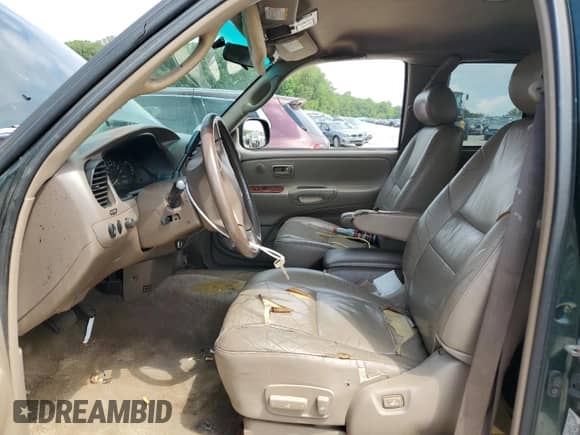 2001 Toyota Tundra Limited z VIN 5TBBT48101S167986, wystawiony jako Copart lot #64989255 z przebiegiem 217 919 mil mil oraz Czysty tytuł • Clean title. Historia ofert i sprzedaży dostępna na DreamBid. Obrazek 7.