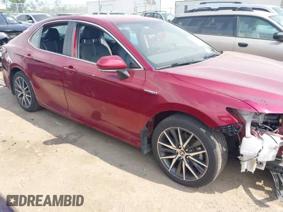 2021 Toyota Camry Hybrid XLE with VIN 4T1F31AK2MU548471, listed as a IAAI auction lot 42593756 with 48,076 mi miles and . Bid and sale history available at DreamBid. Image 14.