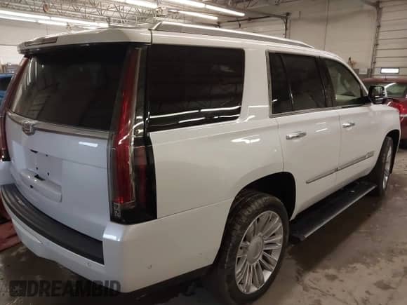 2018 Cadillac Escalade Platinum with VIN 1GYS4DKJ8JR199087, listed as a IAAI auction lot 42062074 with 97,751 mi miles and . Bid and sale history available at DreamBid. Image 4.