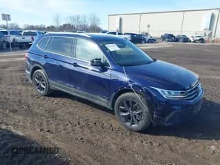 2023 Volkswagen Tiguan SE with VIN 3VVNB7AX3PM040666, listed as a IAAI auction lot 41771816 with 28,832 mi miles and . Bid and sale history available at DreamBid. Image 1.