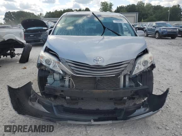 2012 Toyota Sienna XLE with VIN 5TDYK3DC6CS235796, listed as a Copart auction lot 70565525 with 120,990 mi miles and Clean title. Bid and sale history available at DreamBid. Image 5.