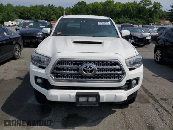 2016 Toyota Tacoma TRD Sport z VIN 3TMCZ5AN5GM009665, wystawiony jako Copart lot #59667805 z przebiegiem 54 183 mil mil oraz Szkoda całkowita • Salvage title. Historia ofert i sprzedaży dostępna na DreamBid. Obrazek 5.