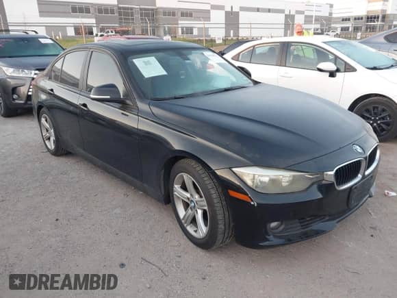 2014 BMW 3 Series 328i with VIN WBA3C1C59EK107882, listed as a IAAI auction lot 43398971 with 187,068 mi miles and . Bid and sale history available at DreamBid. Image 1.