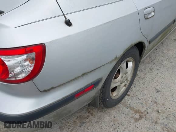 2004 Hyundai Elantra GT z VIN KMHDN56D34U104065, wystawiony jako IAAI lot #42773027 z przebiegiem 161 989 mil mil oraz . Historia ofert i sprzedaży dostępna na DreamBid. Obrazek 6.