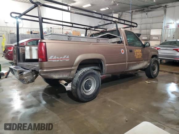 1997 Chevrolet Silverado 2500 с VIN 1GCGK24R4VZ218989, выставлен на аукционе Copart как лот 81666954 с пробегом 286 219 миль миль и Списание • Salvage title. История ставок и продаж доступна на DreamBid. Изображение 3.