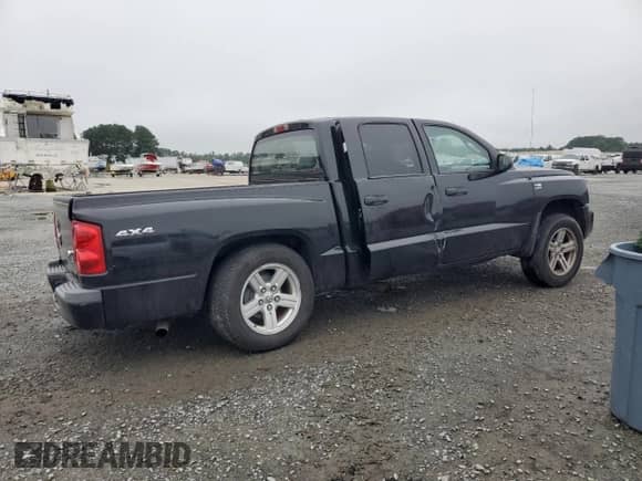 2009 Dodge Dakota Bighorn/Lonestar z VIN 1D7HW38P69S774233, wystawiony jako Copart lot #68258815 z przebiegiem 163 677 mil mil oraz Szkoda całkowita • Salvage title. Historia ofert i sprzedaży dostępna na DreamBid. Obrazek 3.
