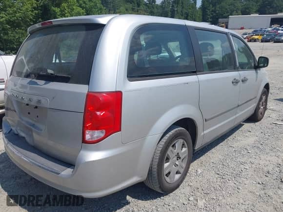 2012 Dodge Grand Caravan American Value z VIN 2C4RDGBGXCR258518, wystawiony jako IAAI lot #42585471 z przebiegiem 221 504 mil mil oraz . Historia ofert i sprzedaży dostępna na DreamBid. Obrazek 4.