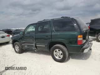 2001 Chevrolet Tahoe LT with VIN 1GNEK13T01J148132, listed as a Copart auction lot 86844615 with 309,105 mi miles and Salvage title. Bid and sale history available at DreamBid. Image 2.