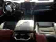 2020 Ram 1500 Rebel z VIN 1C6SRFLT7LN199084, wystawiony jako Copart lot #64990655 z przebiegiem 143 021 mil mil oraz Nie do naprawy • Non repairable. Historia ofert i sprzedaży dostępna na DreamBid. Obrazek 8.