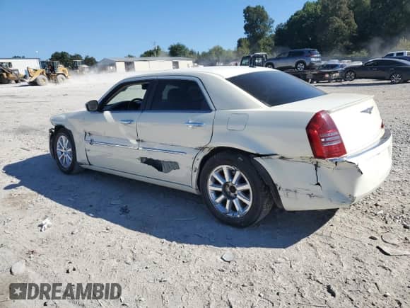 2006 Chrysler 300 C with VIN 2C3KA63H76H417831, listed as a Copart auction lot 71081355 with 115,408 mi miles and Salvage title. Bid and sale history available at DreamBid. Image 2.
