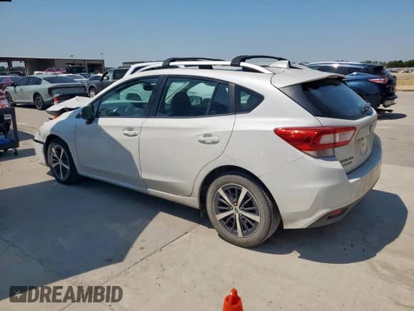 2019 Subaru Impreza Premium with VIN 4S3GTAD67K3738552, listed as a Copart auction lot 71272245 with 104,659 mi miles and Salvage title. Bid and sale history available at DreamBid. Image 2.
