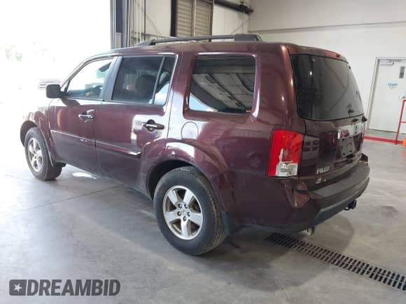 2011 Honda Pilot EX with VIN 5FNYF3H44BB047675, listed as a IAAI auction lot 42996669 with 140,655 mi miles and . Bid and sale history available at DreamBid. Image 3.